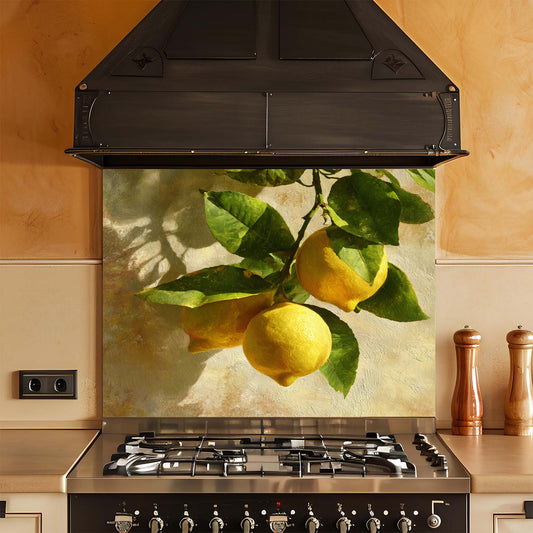 Kitchen stove with a decorative glass backsplash featuring lemons and leaves.