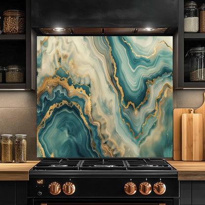 Kitchen stove with a decorative backsplash featuring blue and gold marbled pattern.