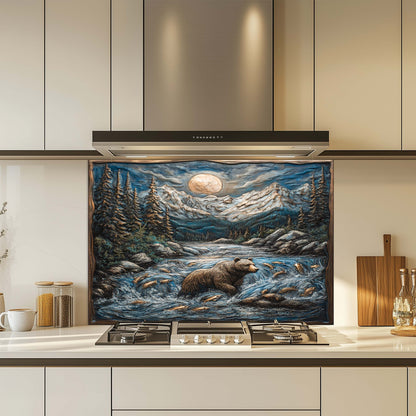 Kitchen with a tempered glass backsplash featuring a bear and nature scene above a stove.