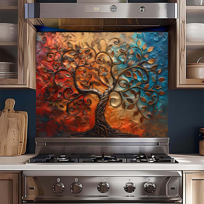Stainless steel oven with decorative glass panel featuring a tree design in a kitchen setting.