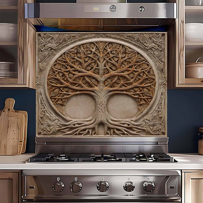 Stainless steel gas stove with decorative tree design on the back splash in a kitchen setting.