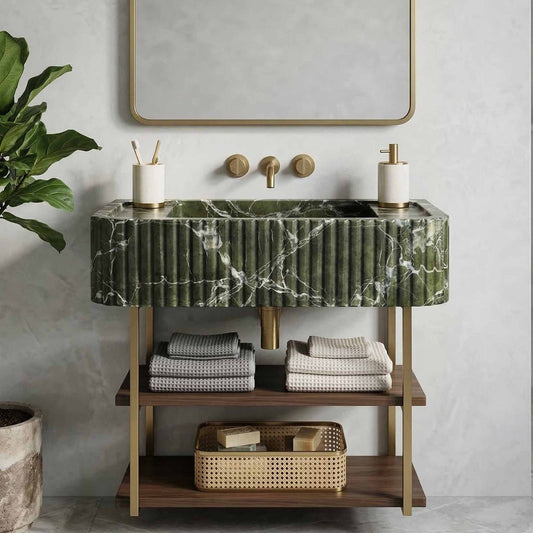Bathroom vanity with green marble top, wooden shelves, and decorative items.