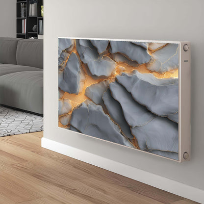 Modern magnetic radiator cover with abstract design on a wall in a living room setting