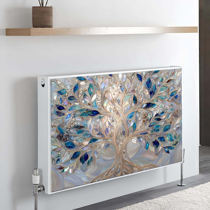 Decorative magnetic radiator cover with tree design on a wall