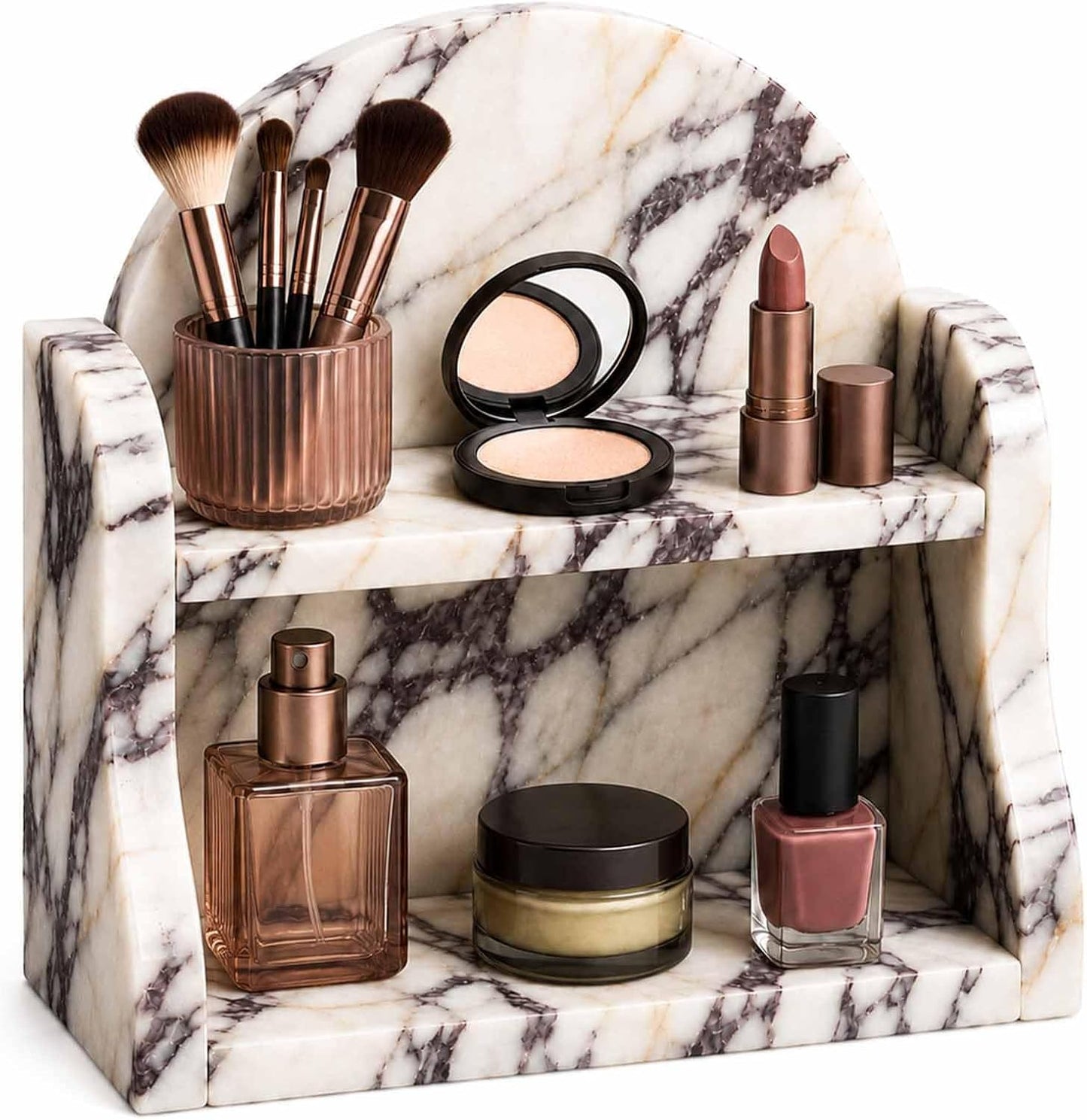 A two-tier marble vanity organizer filled with cosmetics and beauty items, including makeup brushes, a compact mirror, lipstick, pressed powder, a perfume bottle, a cream jar, and nail polish, on a clean white background.