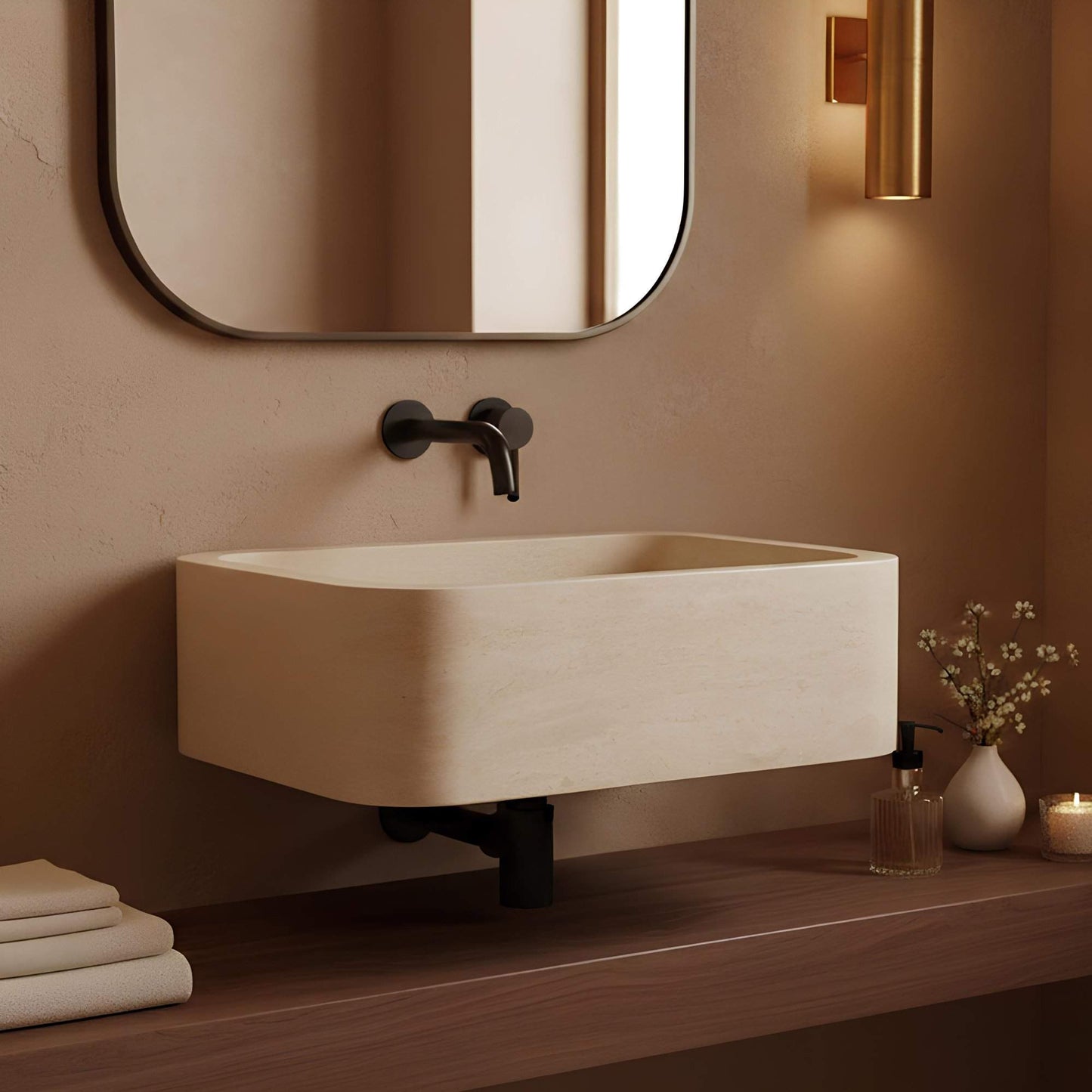 Beige sink with black faucet in a bathroom setting