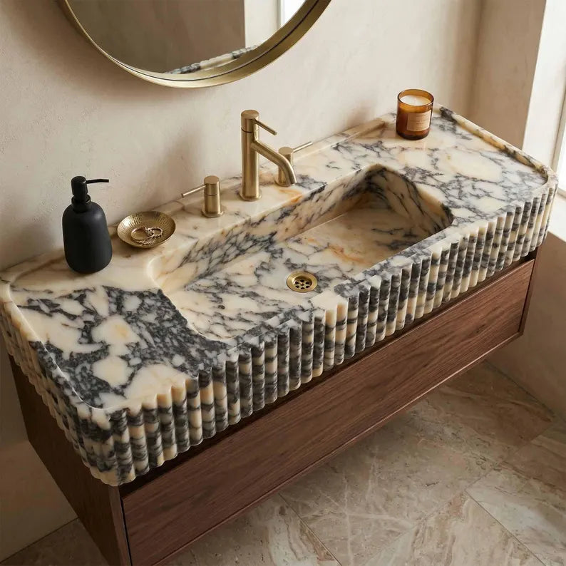 Hand carved calacatta viola marble sink fluted