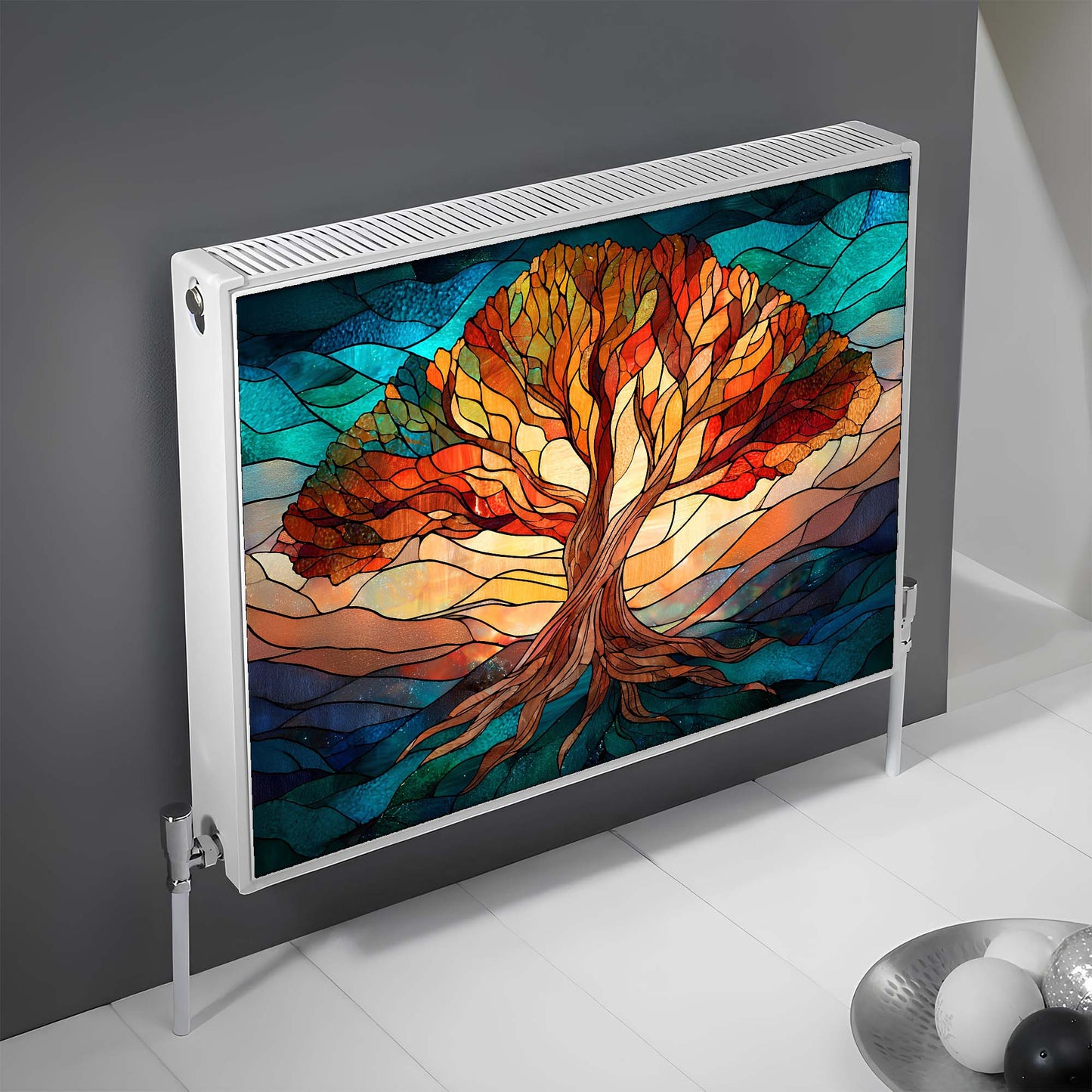 Decorative radiator magnetic cover with a colorful tree design on a gray wall.