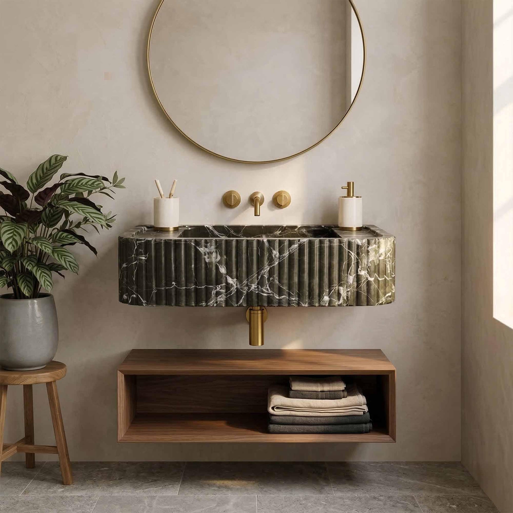 Bathroom with marble sink, wooden cabinet, and round mirror.
