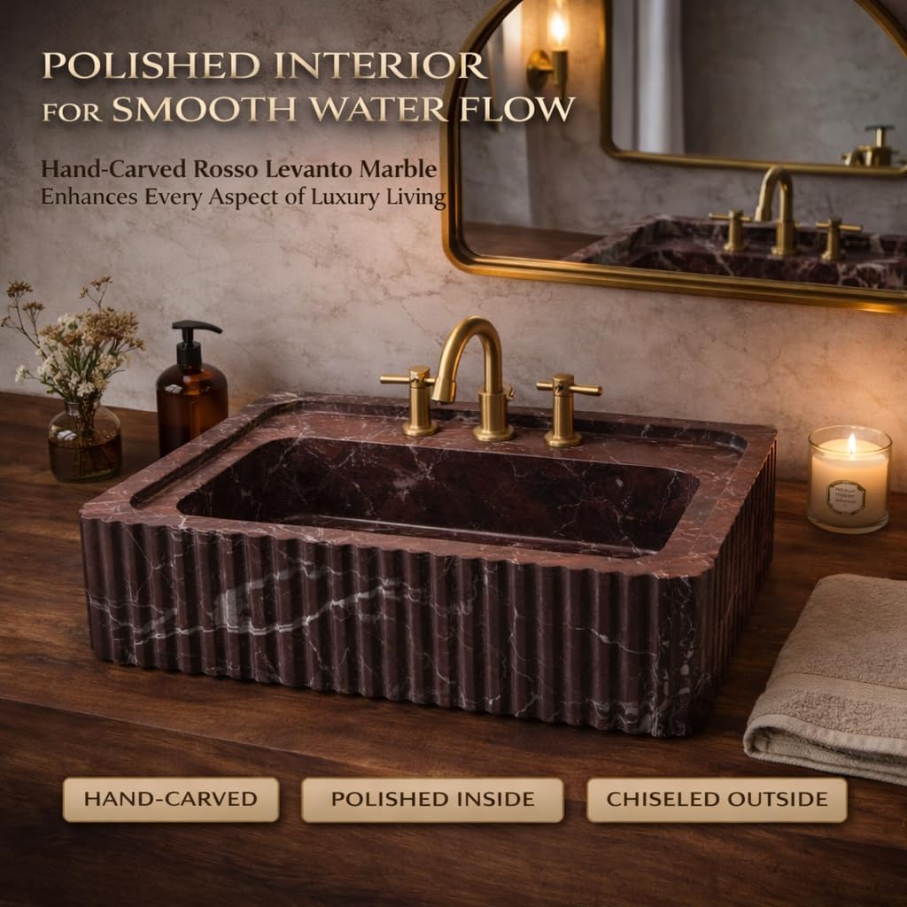 Marble sink with gold faucet in a bathroom setting, featuring text about marble quality.
