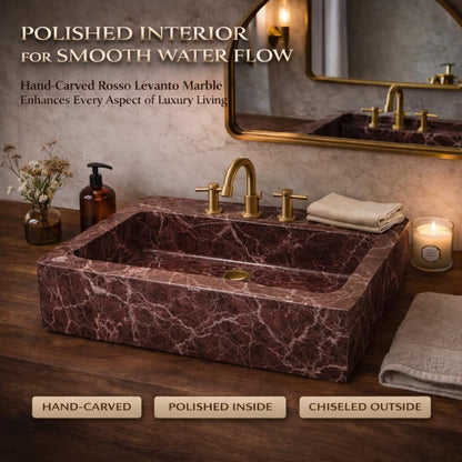 Marble sink with gold faucet in a bathroom setting, featuring text about marble quality.