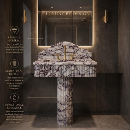 Marble sink with gold fixtures in a bathroom setting, featuring text about material and design.