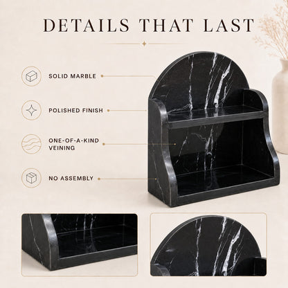 Black marble two-tier shelf with white veining, shown with marketing callouts reading 'DETAILS THAT LAST' and feature points including solid marble, polished finish, one-of-a-kind veining, and no assembly.