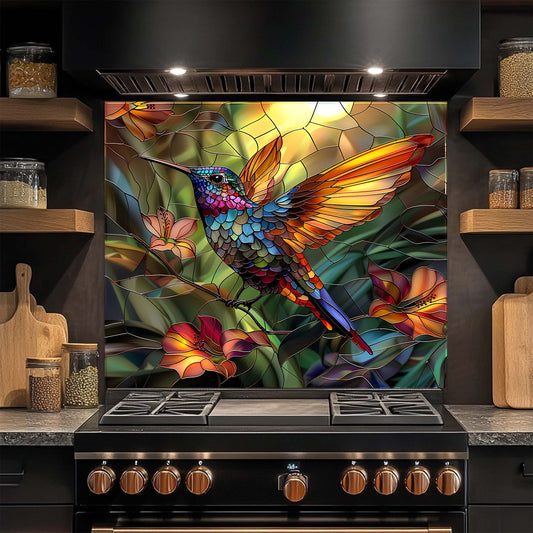 Colorful stained glass-style hummingbird design on a kitchen stove backsplash.