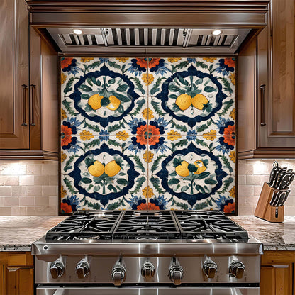 Decorative tile glass backsplash with floral and lemon pattern above a stove in a kitchen.