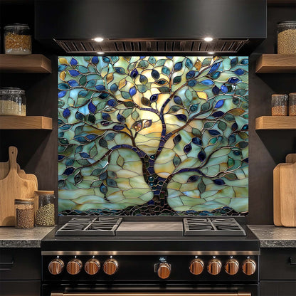 Stained glass tree design backsplash above a stove in a kitchen setting