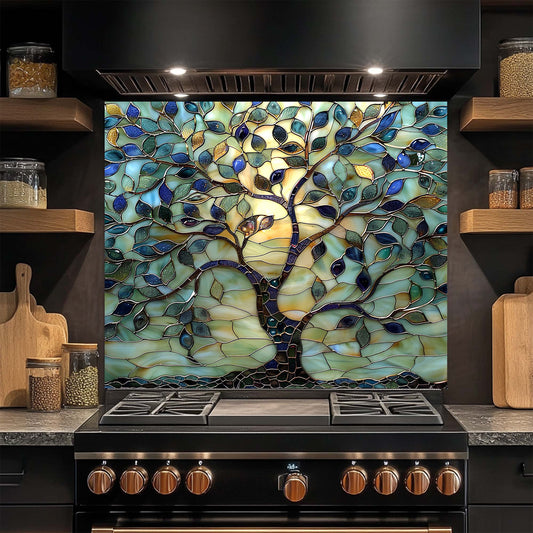 Stained glass tree design backsplash above a stove in a kitchen setting