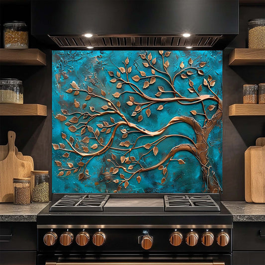Kitchen stove with decorative glass backsplash featuring a tree design on a blue background.