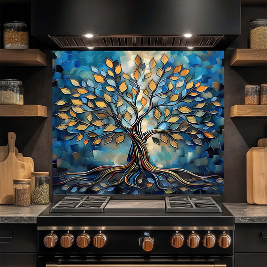 Decorative glass backsplash with a tree design in a kitchen setting