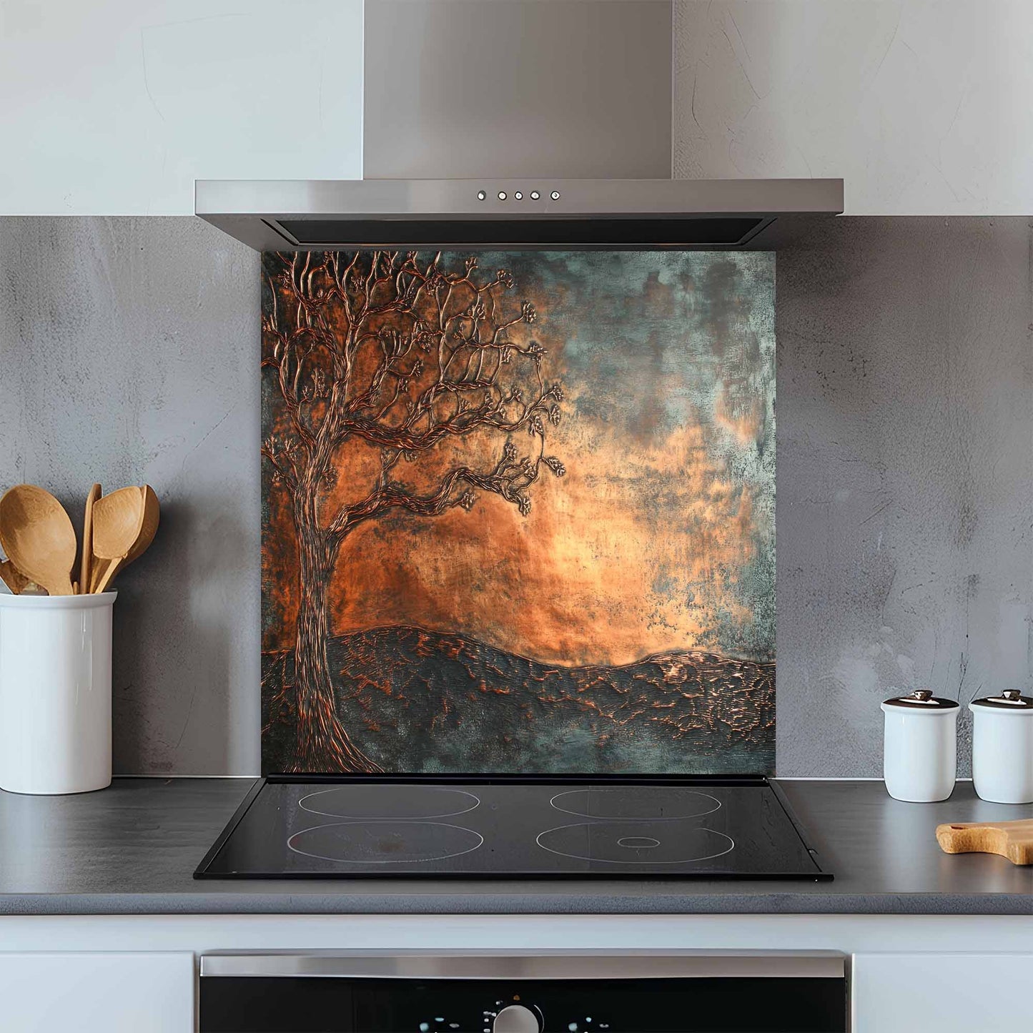 Kitchen with a decorative glass splashback featuring a tree design.