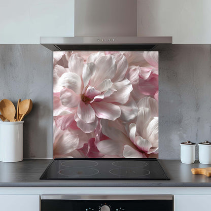 Kitchen with a floral design glass splashback behind a stove