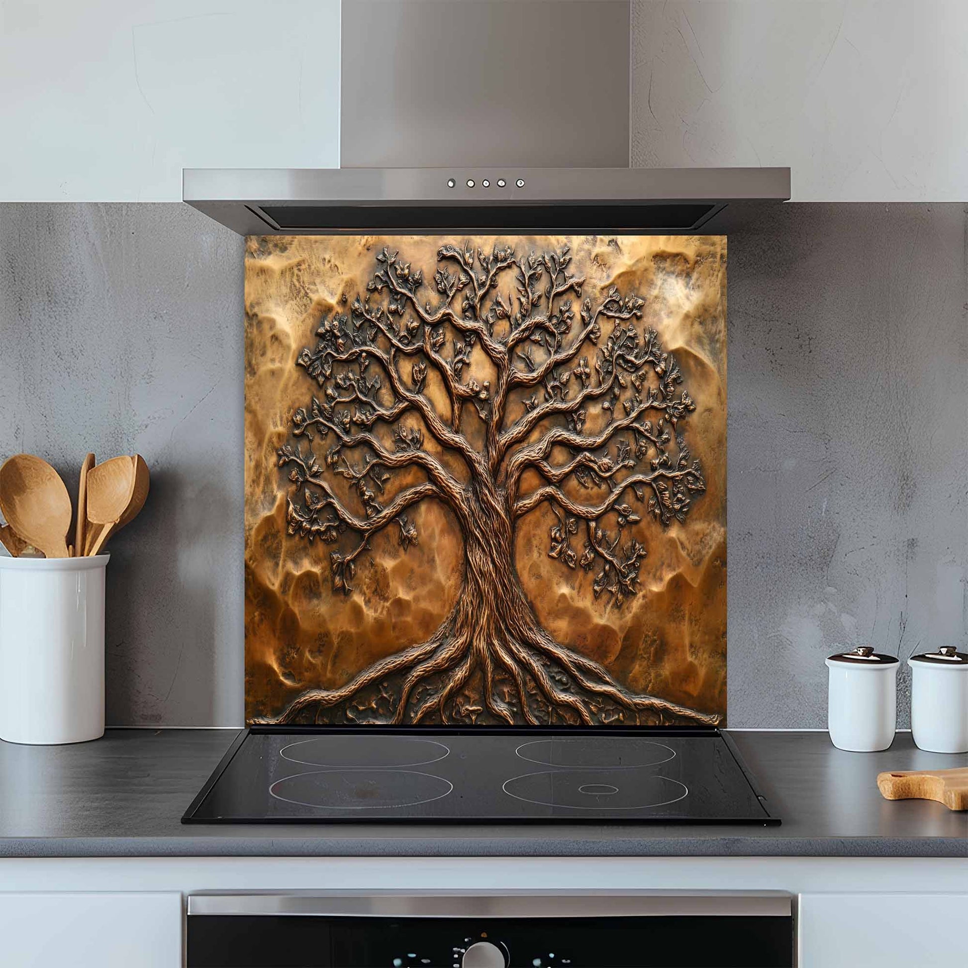 Decorative glass backsplash with tree design in a kitchen setting