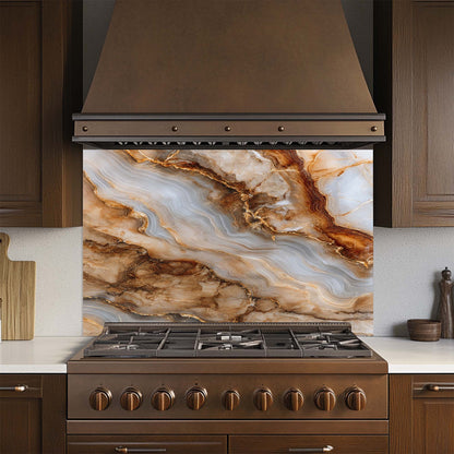 Kitchen stove with glass backsplash and bronze hood