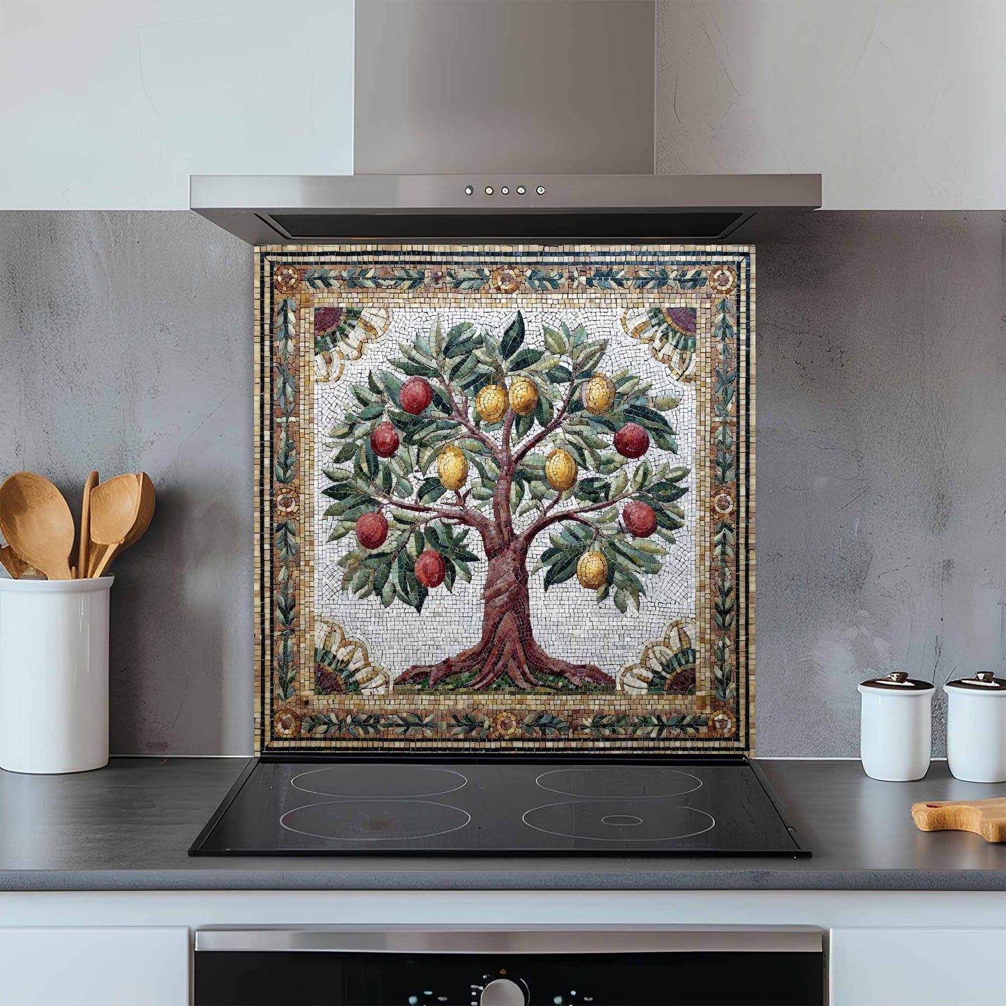 Kitchen backsplash with a decorative tree design featuring fruits and leaves.