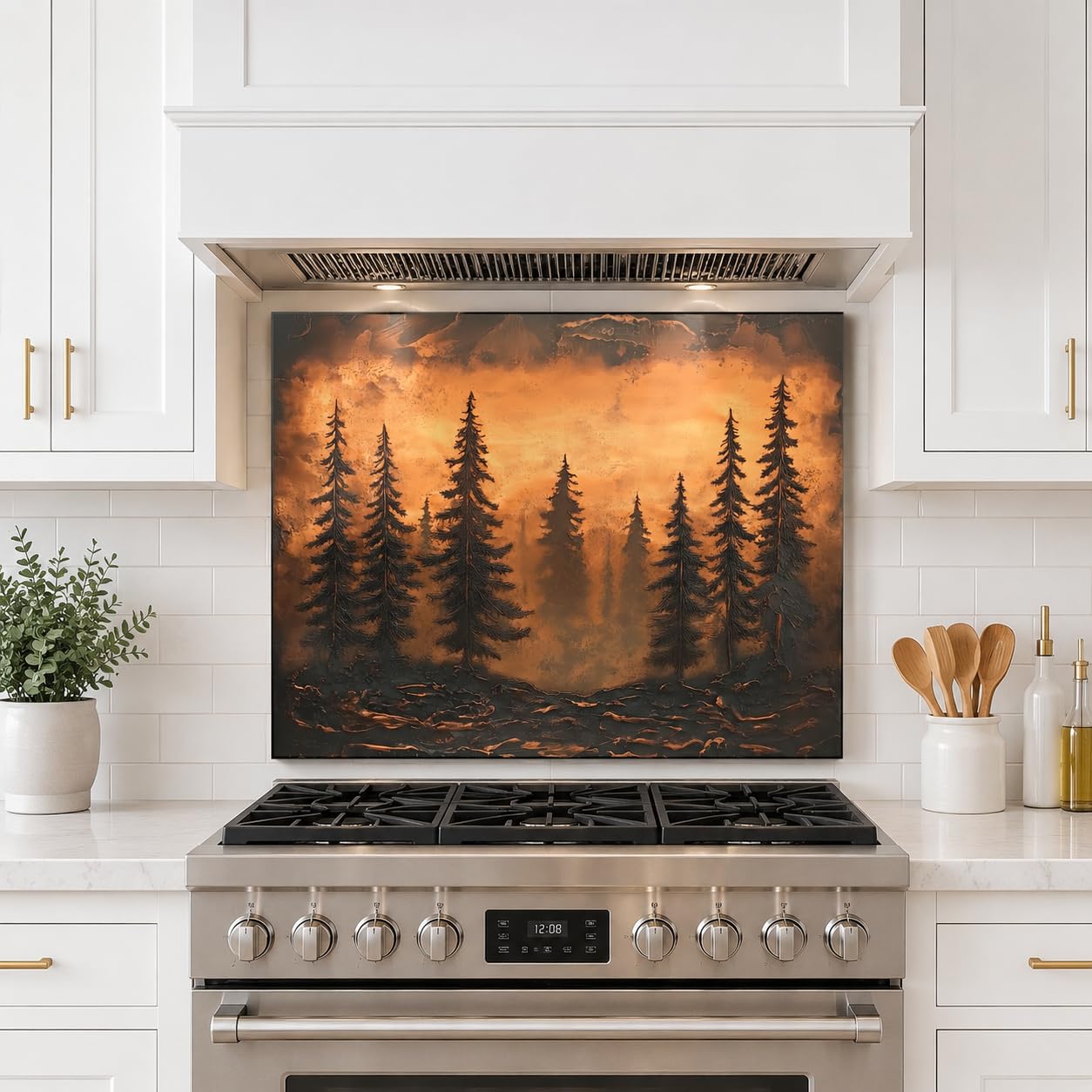 Stainless steel stove with a decorative backsplash of trees and sunset in a modern kitchen.