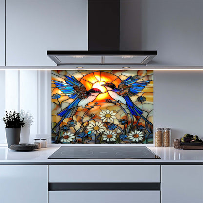 Kitchen with a decorative glass splashback featuring birds and flowers.