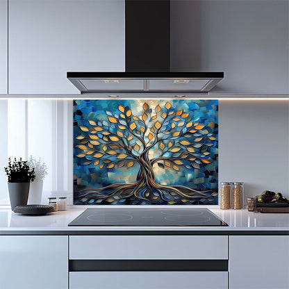 Kitchen with a decorative glass backsplash featuring a tree design.