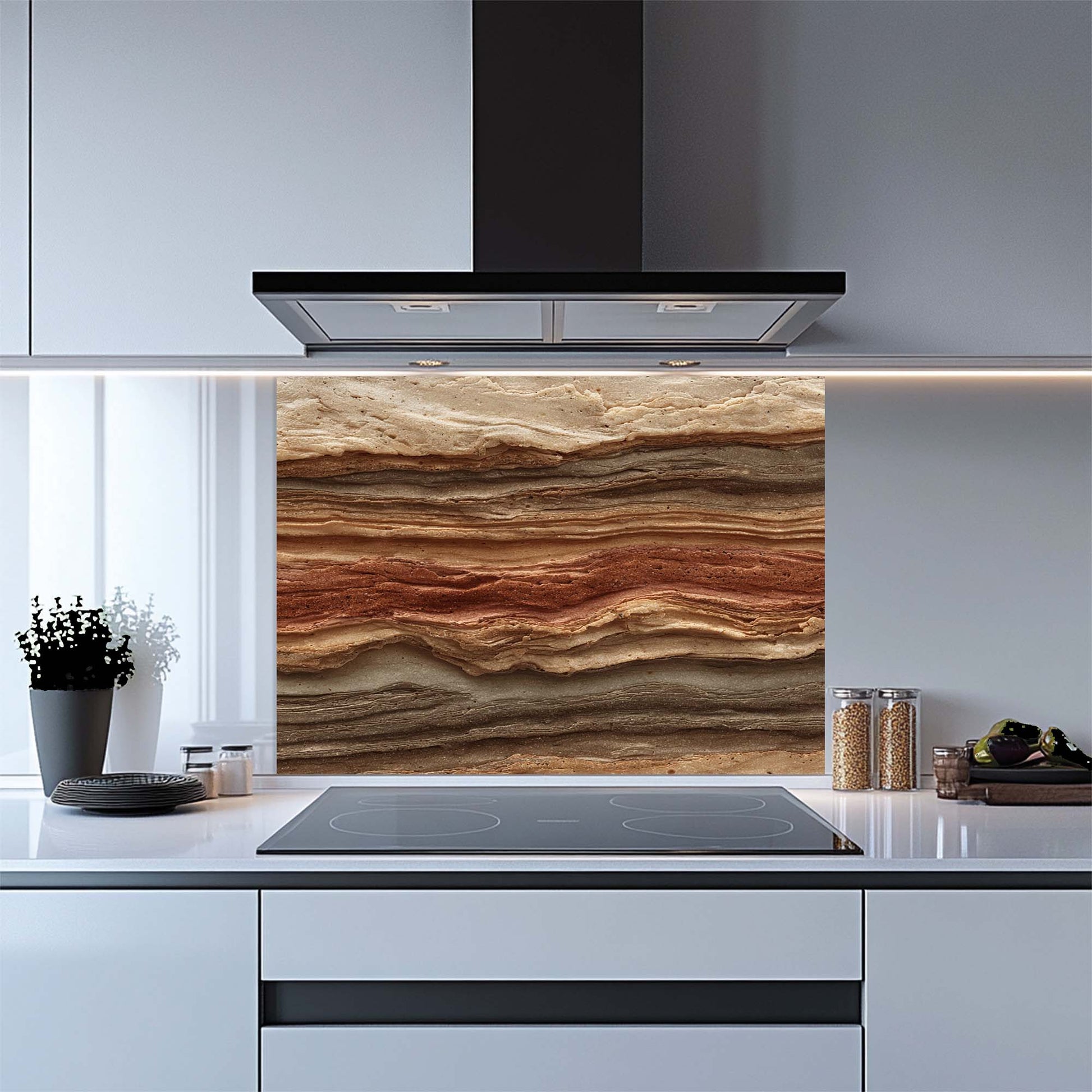 Modern kitchen with a decorative glass splashback featuring layered stone design.
