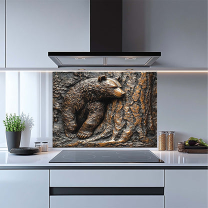 Bear resting by pine tree in copper forest-style tempered glass backsplash – perfect stove backsplash for rustic kitchen.