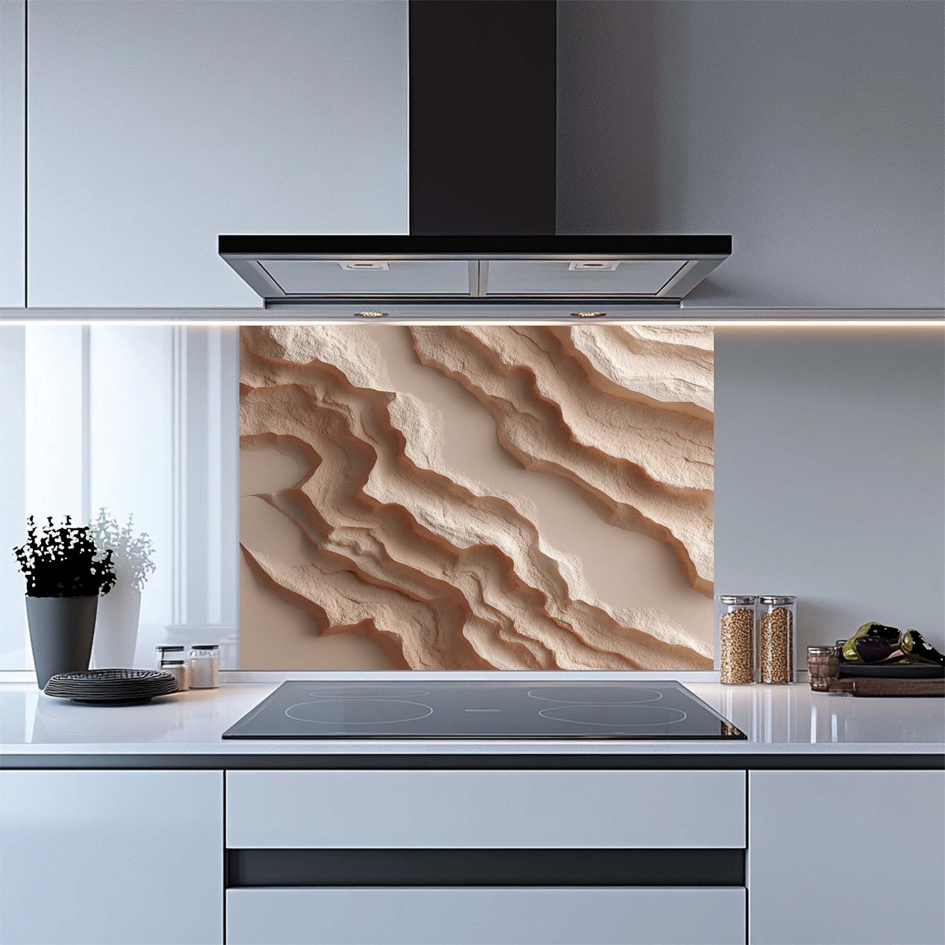Modern kitchen with a decorative glass backsplash featuring wavy beige patterns.