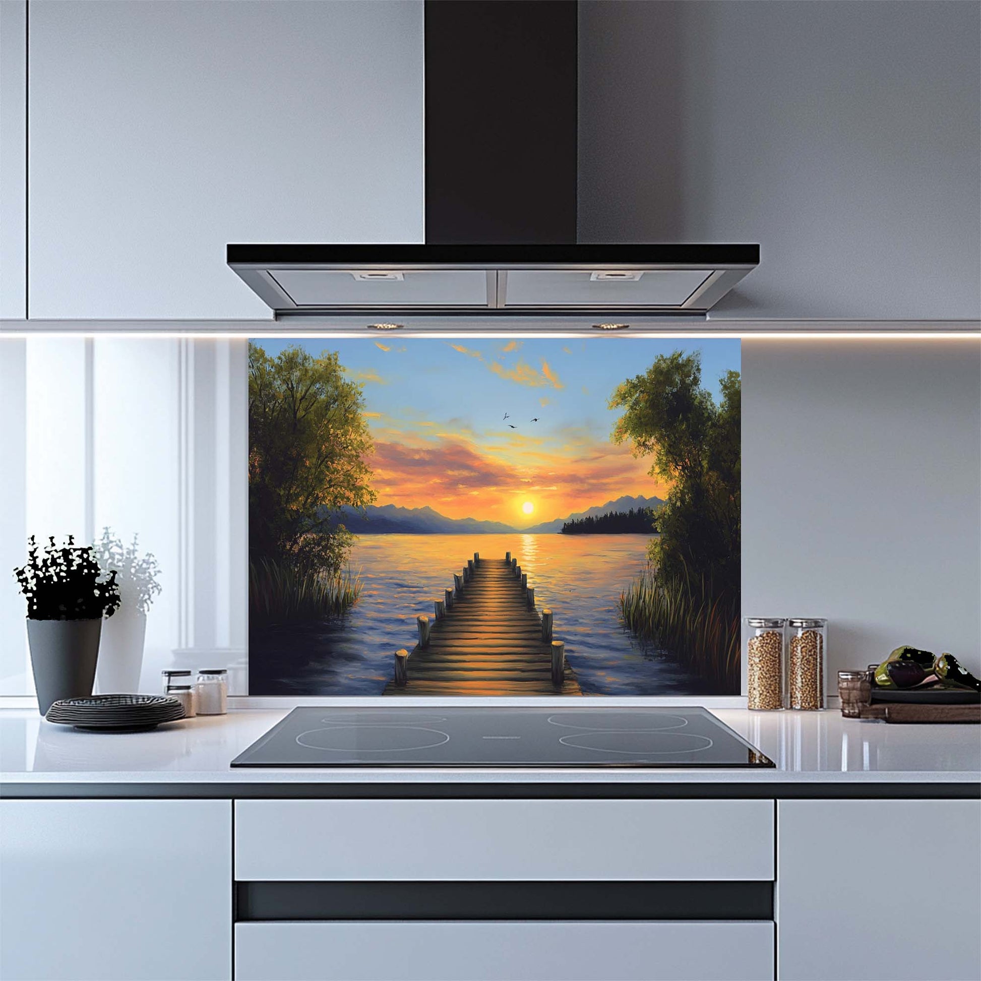 Kitchen with a decorative glass splashback featuring a sunset over a lake scene.