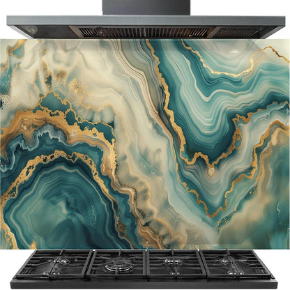 A gas range with a black stovetop cooktop and a matching black range hood, set against a large decorative backsplash featuring an abstract teal, cream, and gold agate or marble pattern.