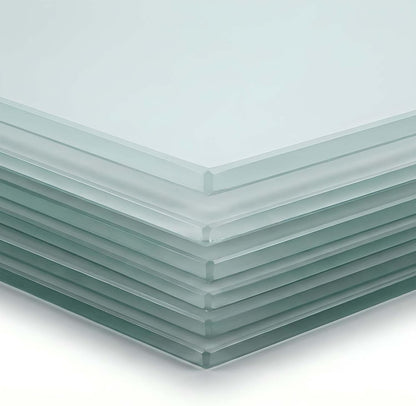 Stack of clear glass panels on a white background