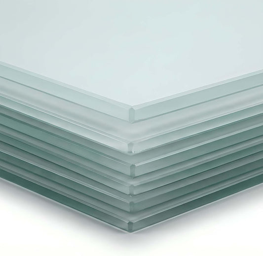 Stack of clear glass panels on a white background