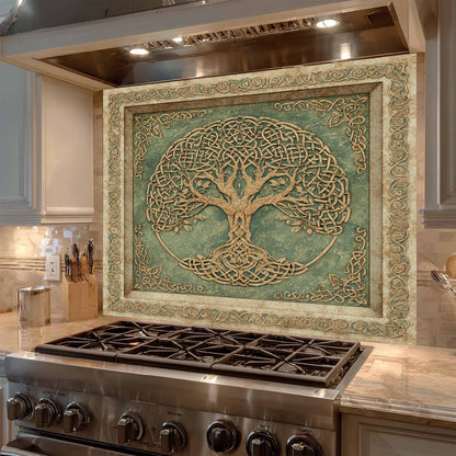 Decorative backsplash with tree of life design above a stove in a kitchen.