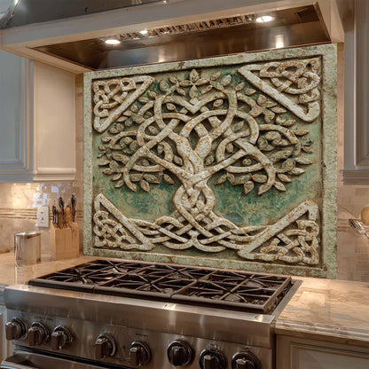 Decorative backsplash with tree design above a stove in a kitchen