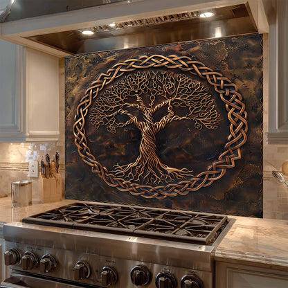 Decorative backsplash with tree design above a stove in a kitchen.
