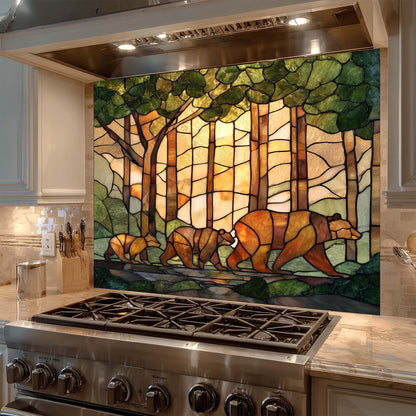 Stained glass backsplash of bears in a forest above a stove in a kitchen.
