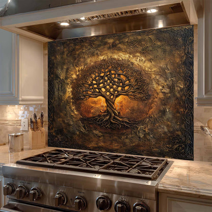 Stainless steel stove with decorative tree backsplash in a kitchen setting