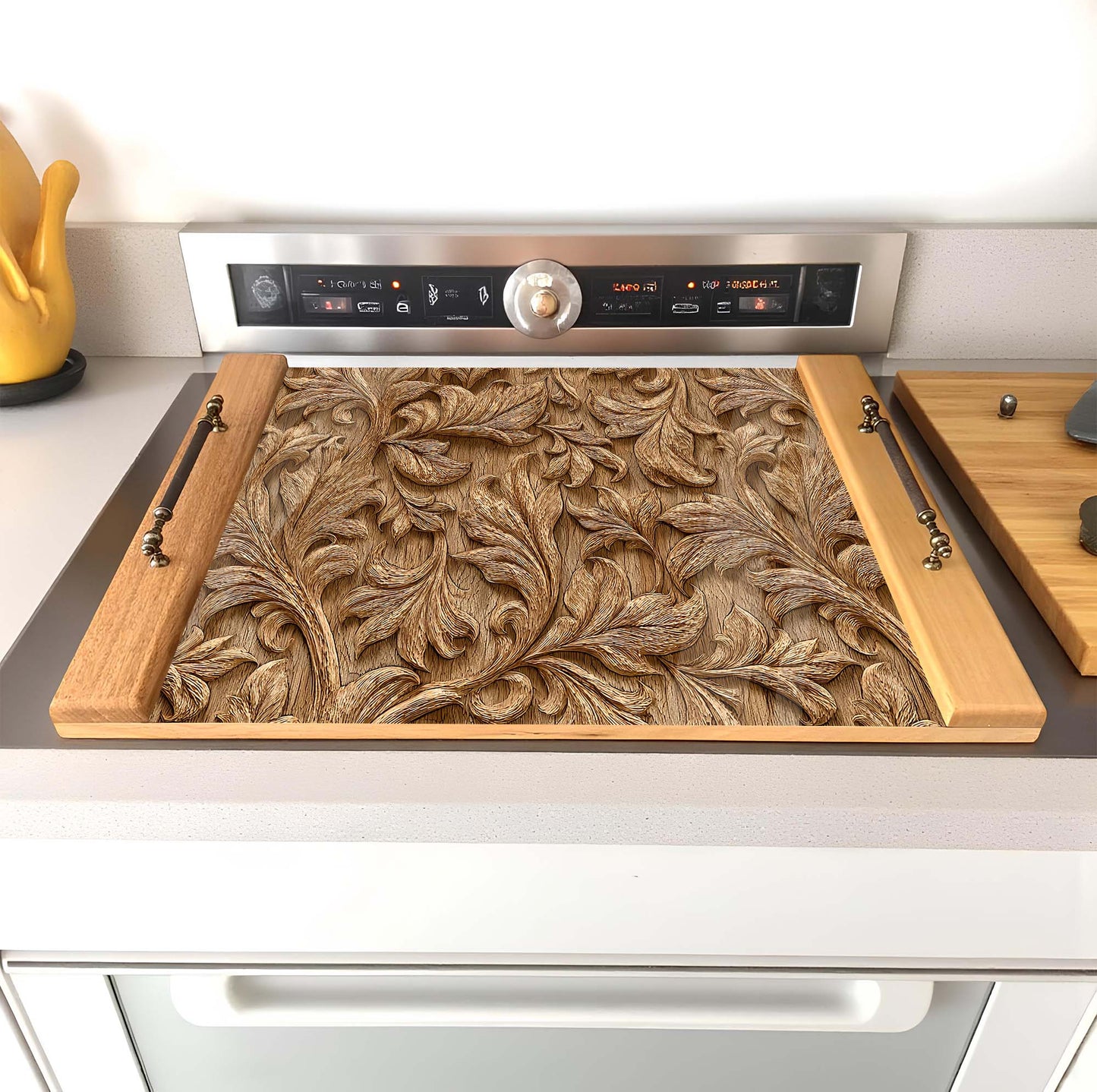 Decorative wooden stove top cover with intricate carvings on a kitchen counter.